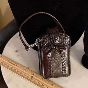 Brighton Dark Brown Leather cell phone case, can be used to carry an accessory.